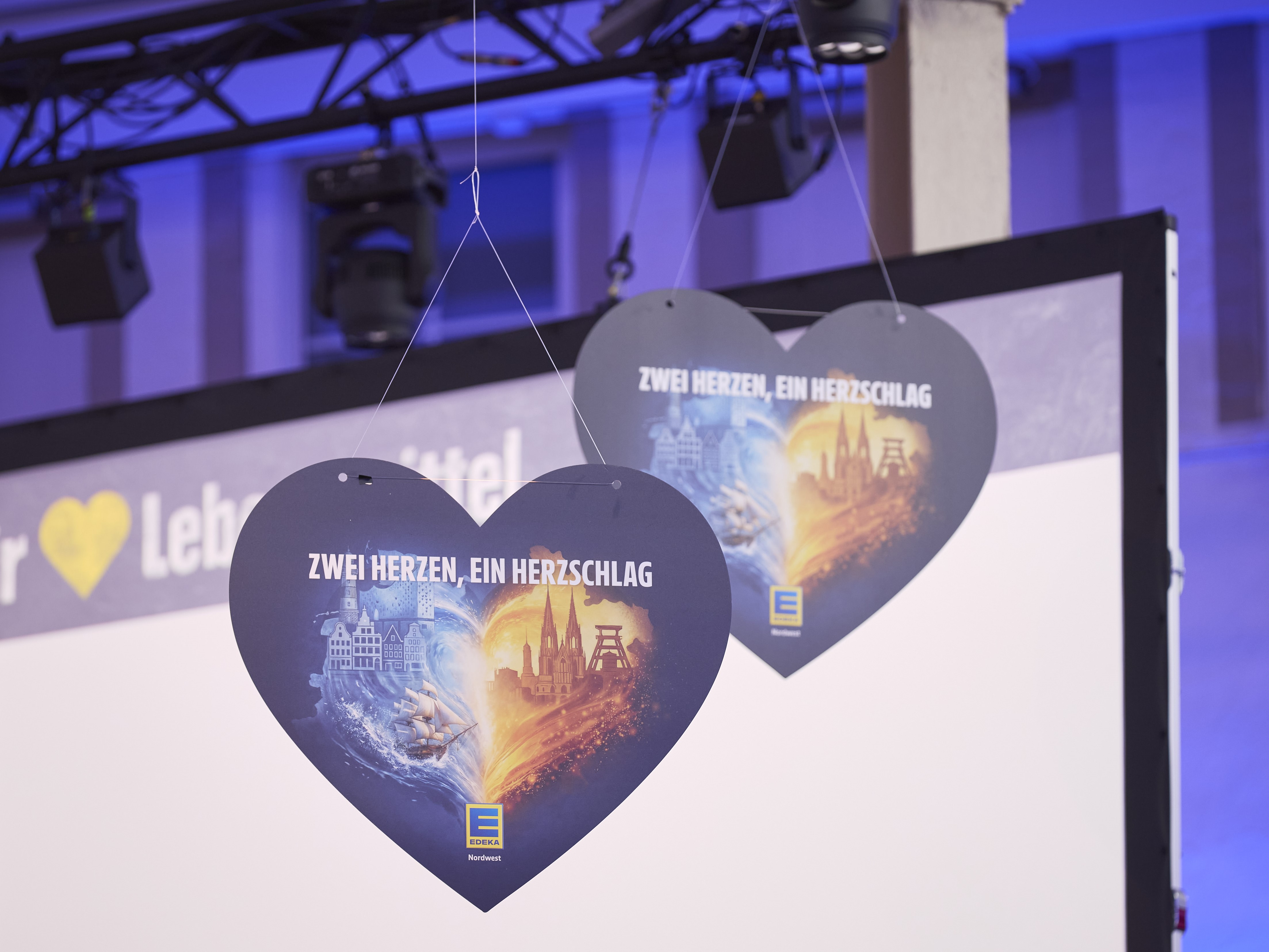 Key Visual der Allianz EDEKA Nordwest: Zwei Herzen, ein Herzschlag